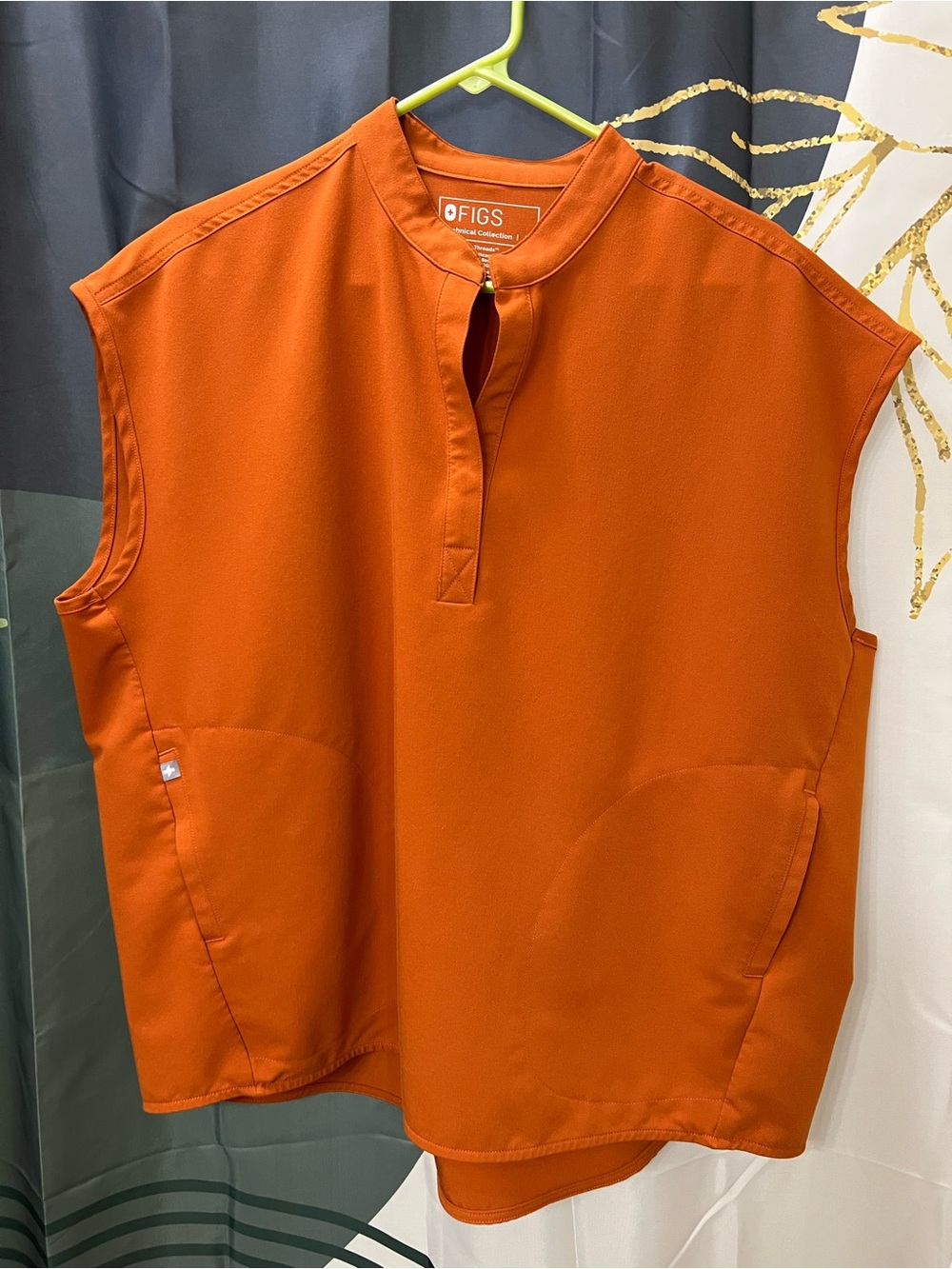 FIGS Women’s Orange Sleeveless Scrub Top with Mandarin Collar and Scrub Pants